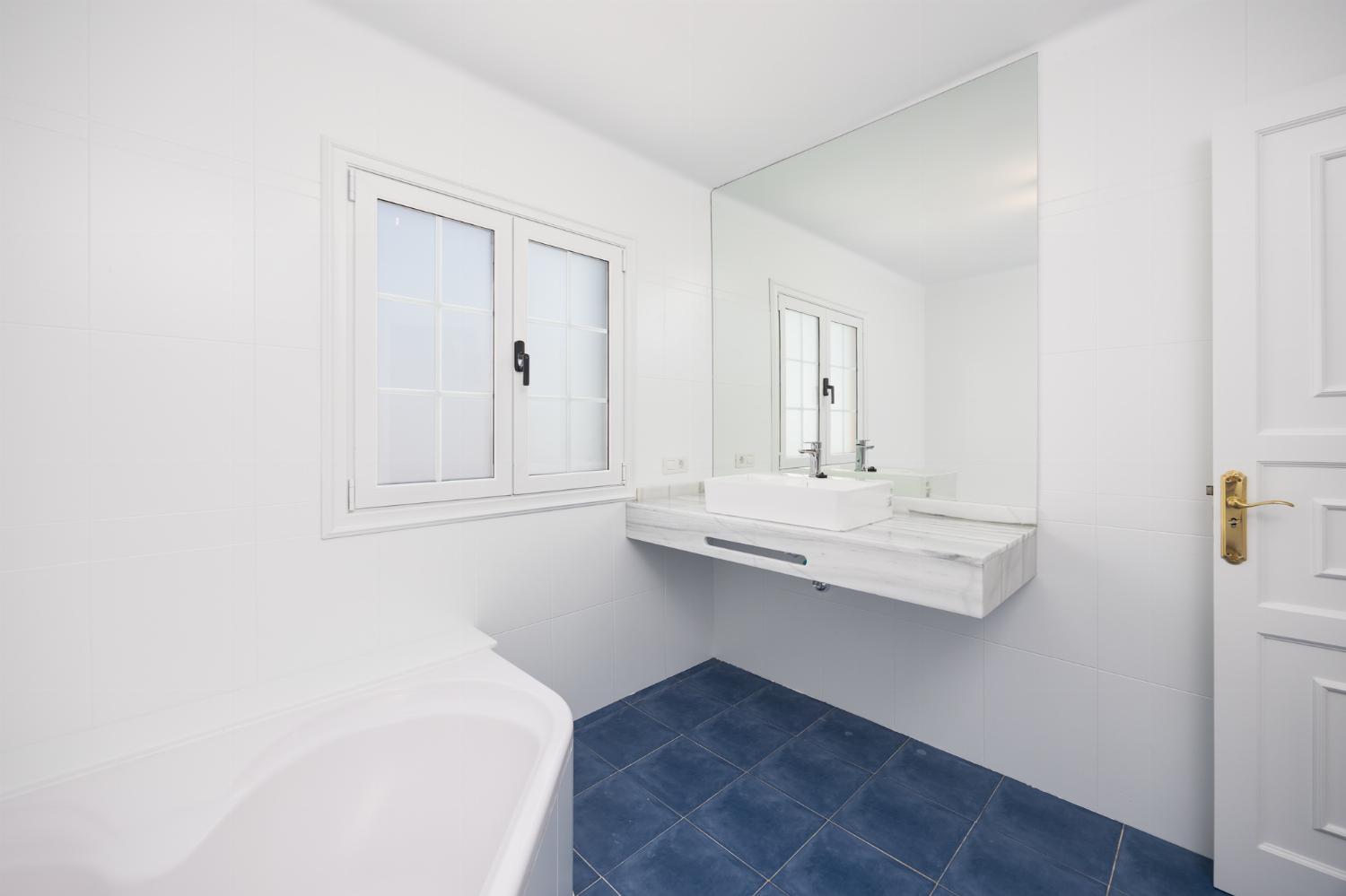 Family bathroom with bath