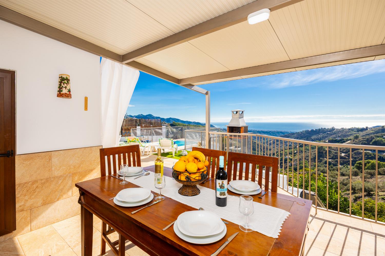 Sheltered terrace area with sea views