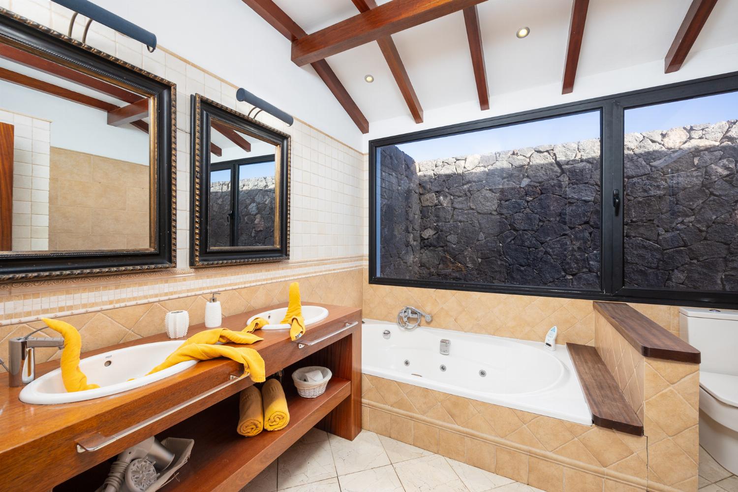 Family bathroom with bath and shower