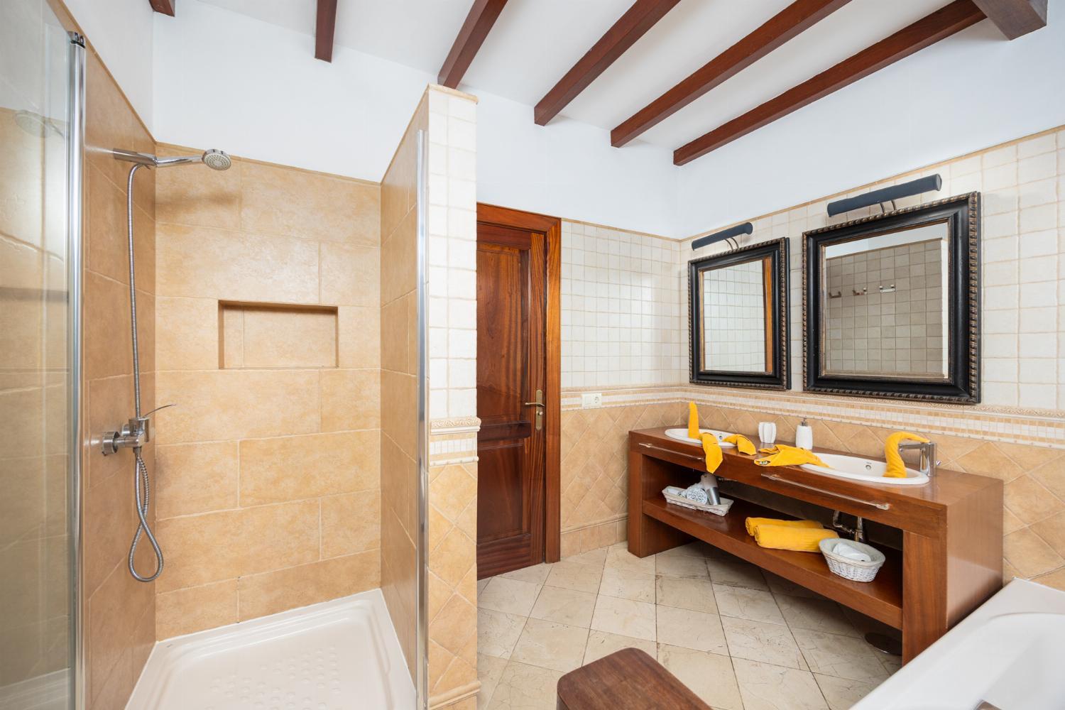 Family bathroom with bath and shower