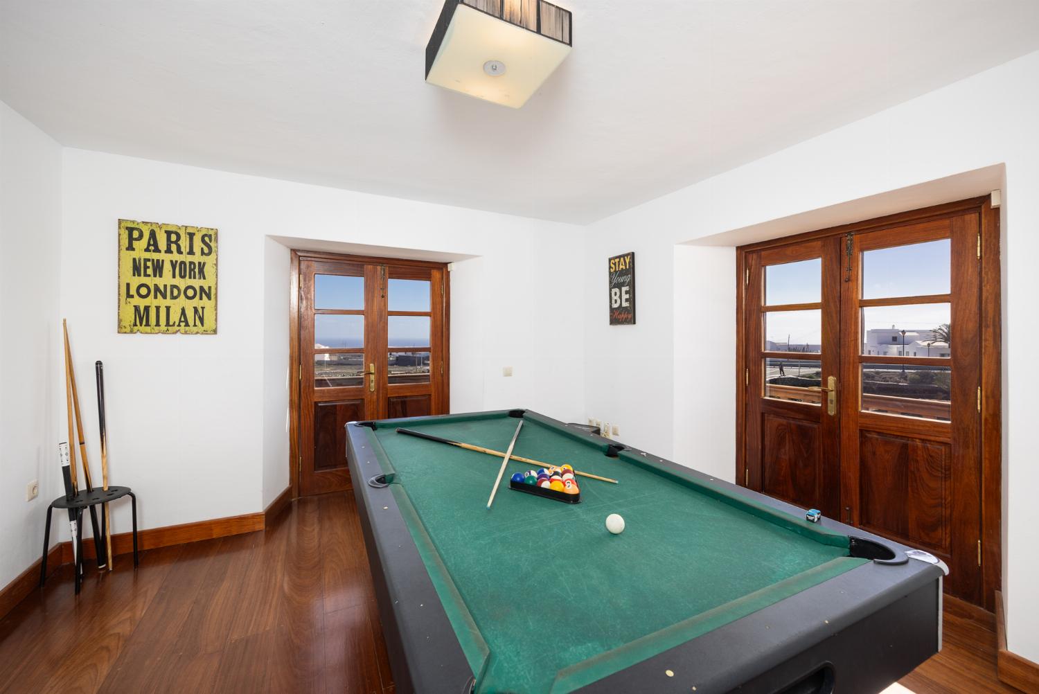 Games room with pool table