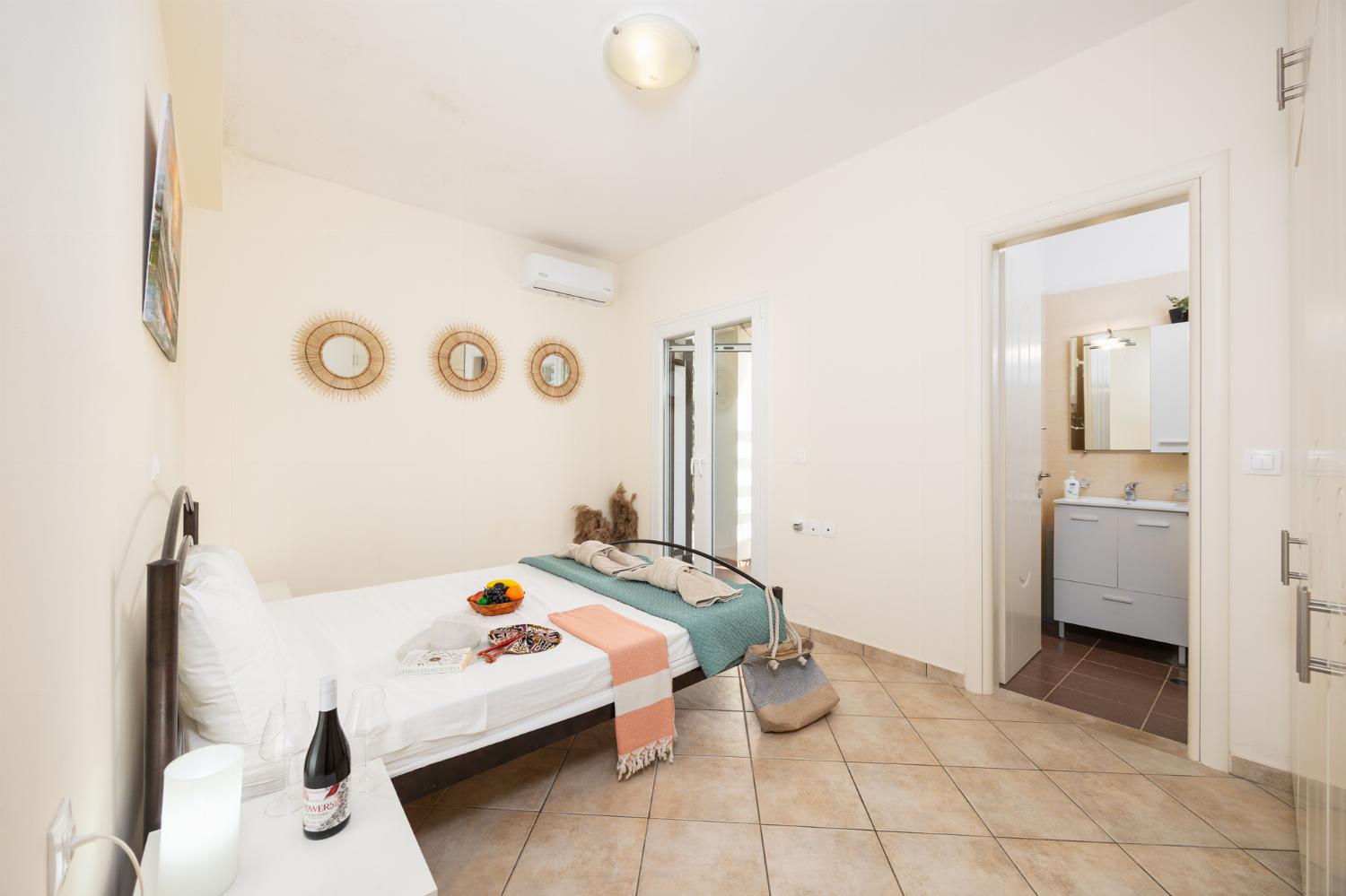 Double bedroom with en suite bathroom and A/C