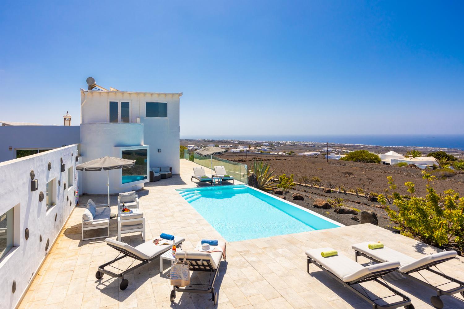 ,Beautiful villa with private pool, terrace, and garden with panoramic sea views