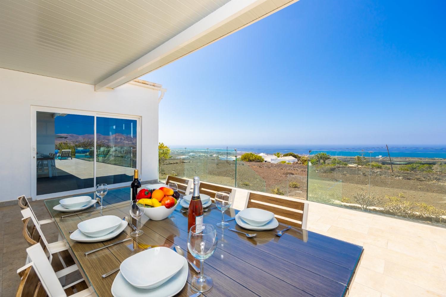 Sheltered terrace area with panoramic sea views