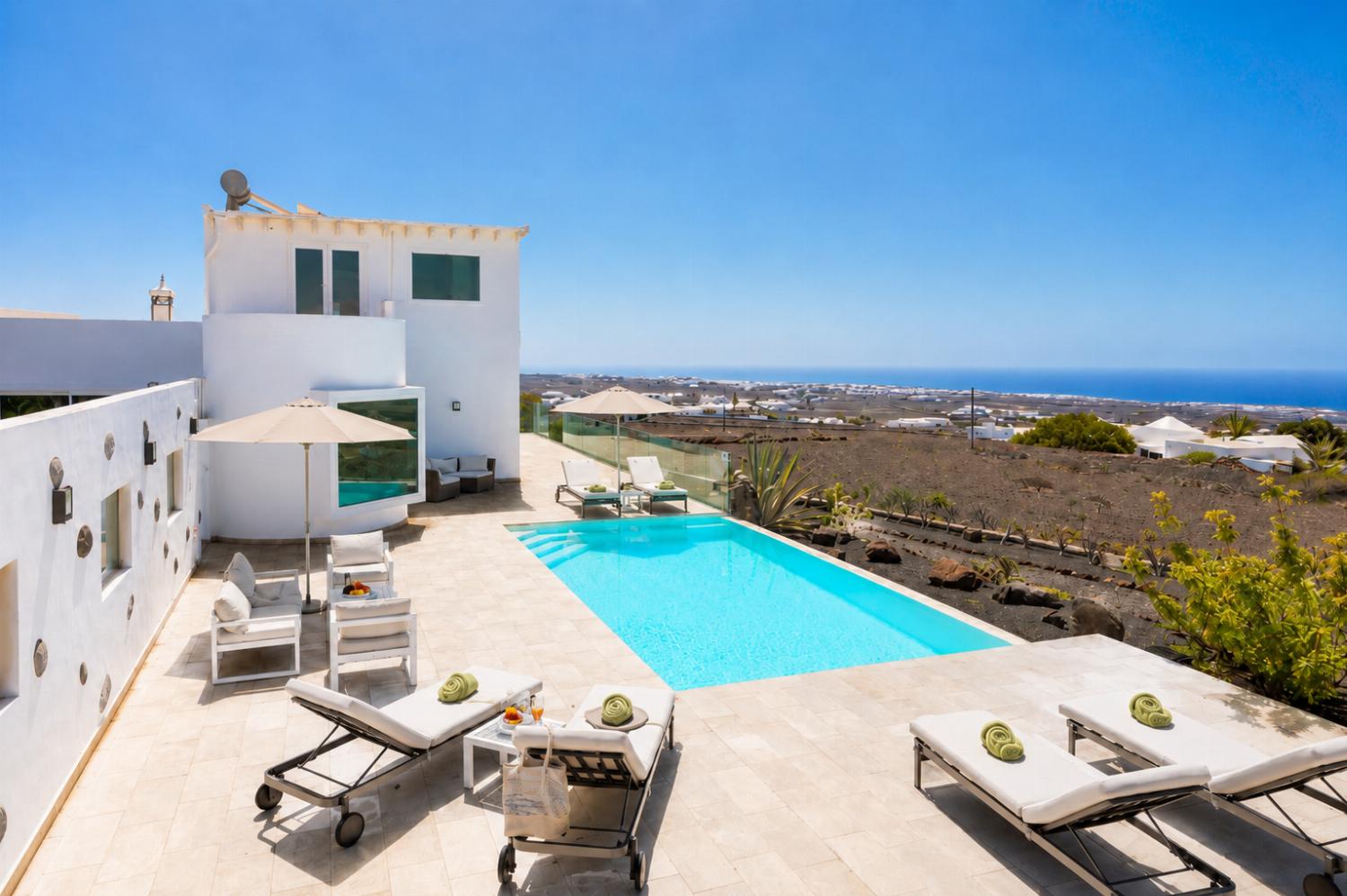 ,Beautiful villa with private pool, terrace, and garden with panoramic sea views