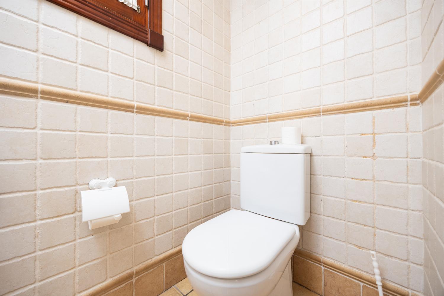 En suite bathroom with bath and shower