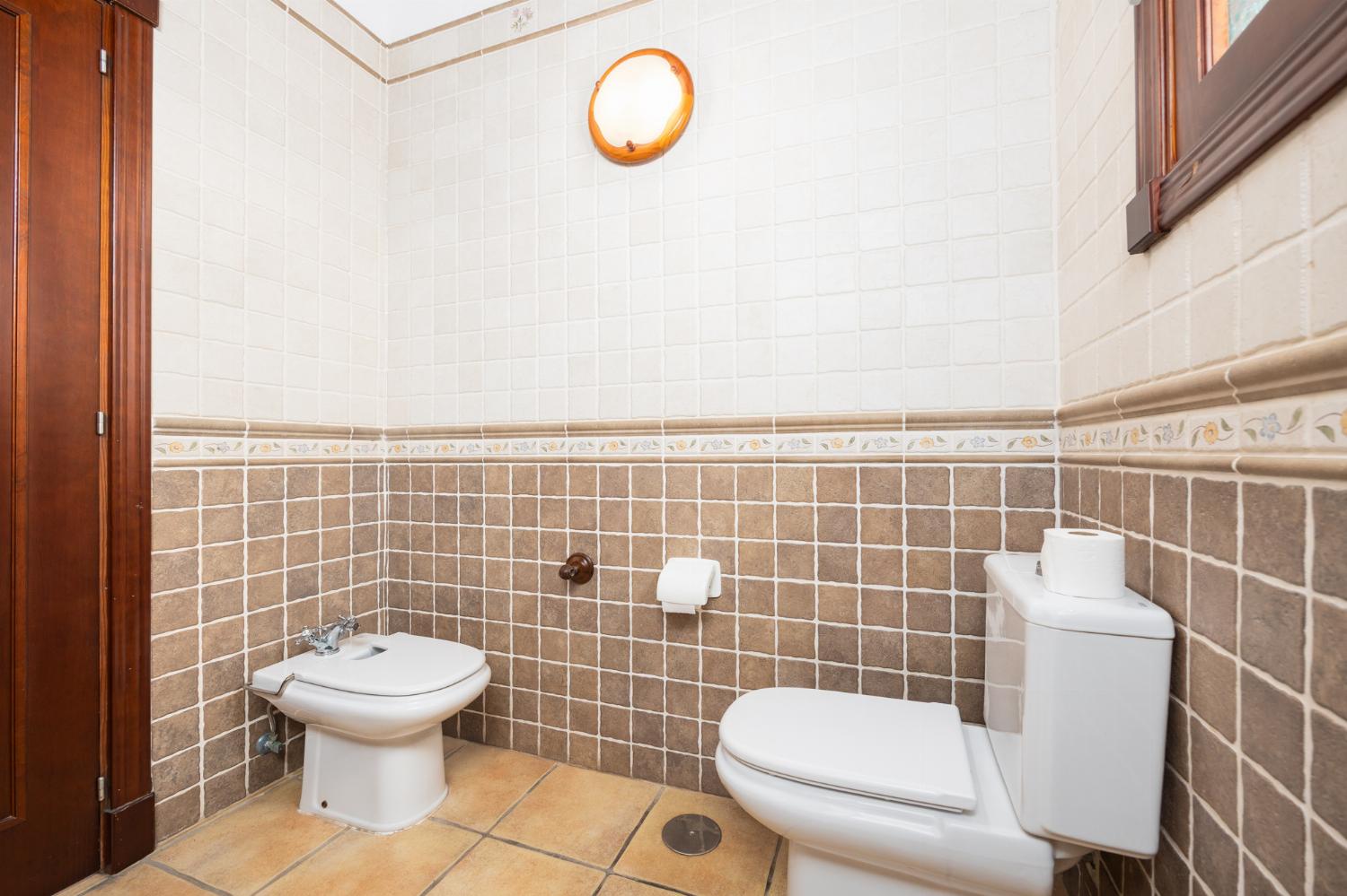 Family bathroom with bath and shower