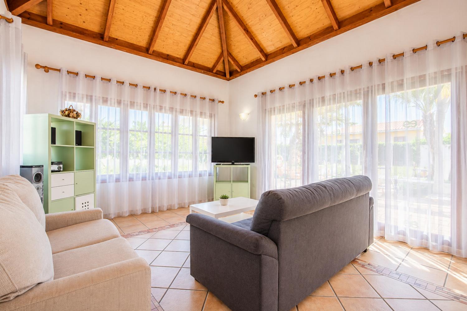 Living room with sofas, WiFi internet, and satellite TV