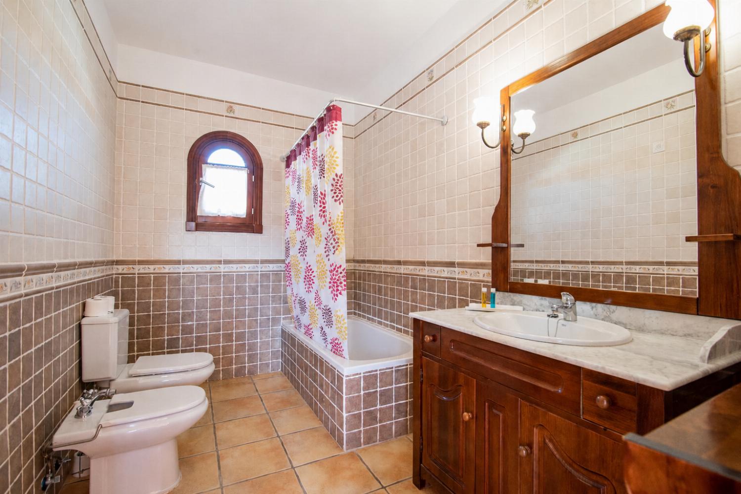 Family bathroom with bath