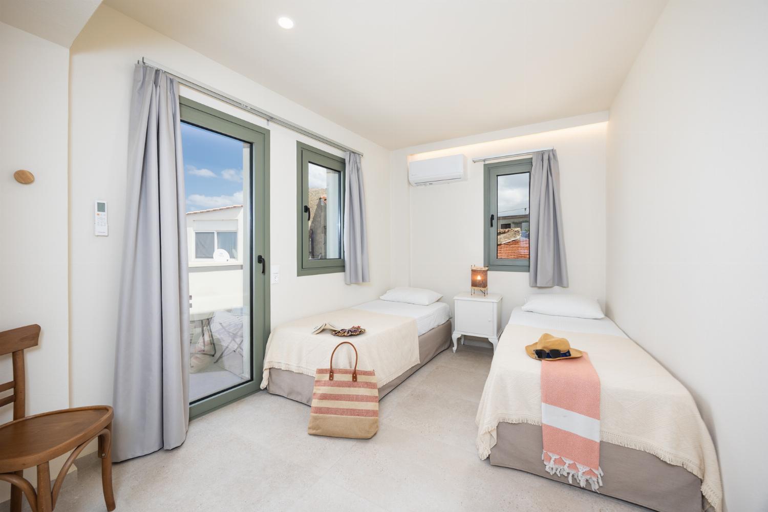 Twin bedroom with A/C