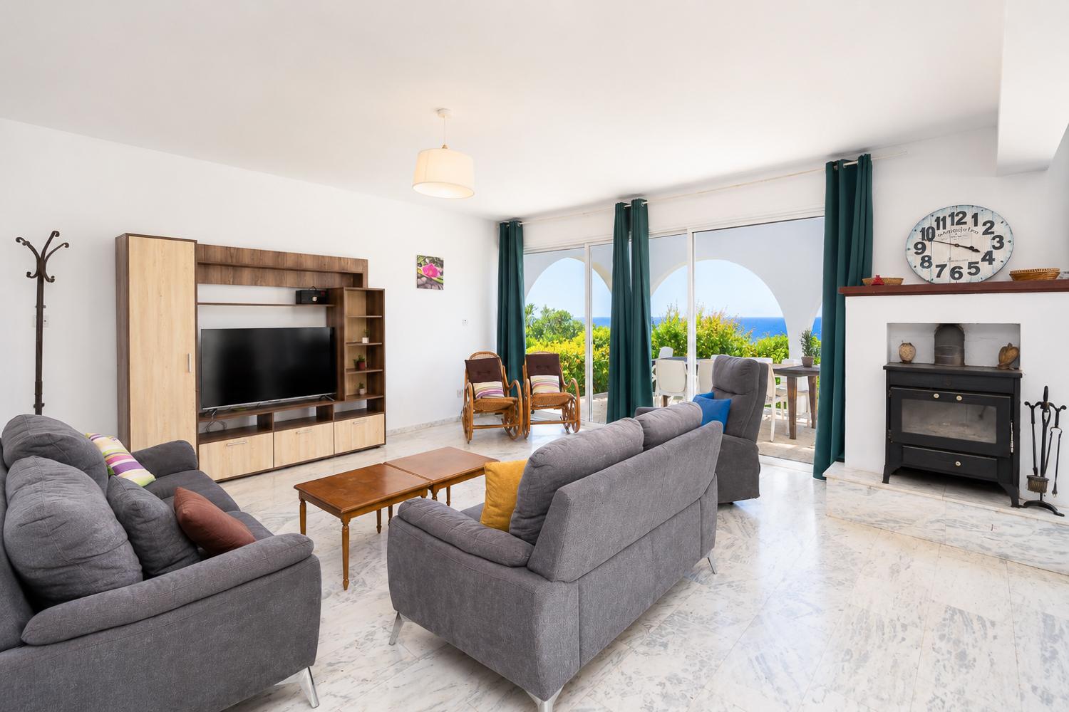 Living room with sofas, WiFi internet, and satellite TV