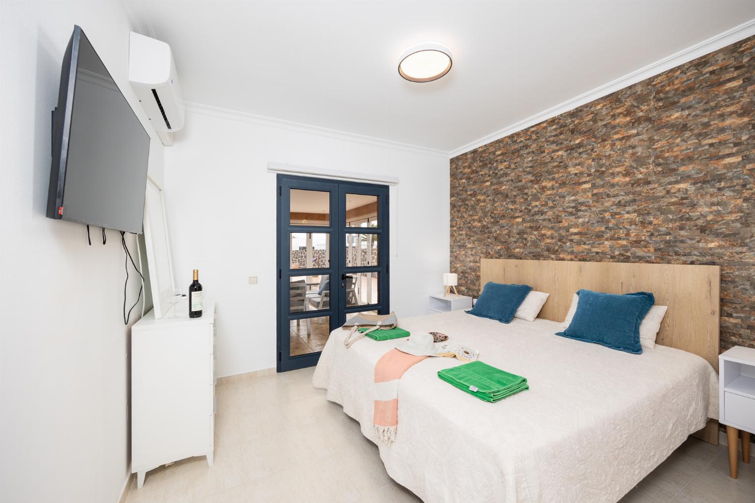 Double bedroom with en suite bathroom and A/C