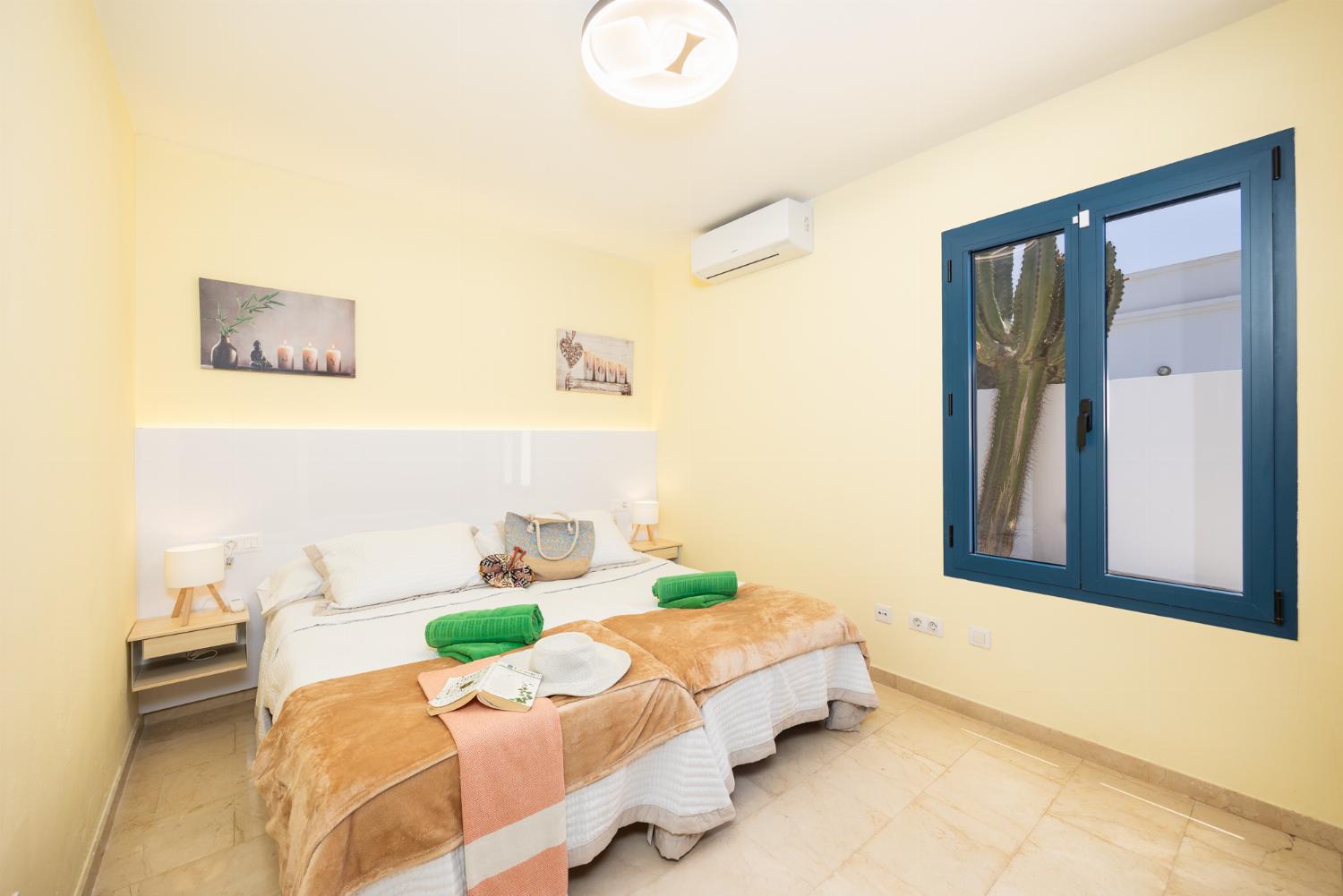 Twin bedroom with A/C
