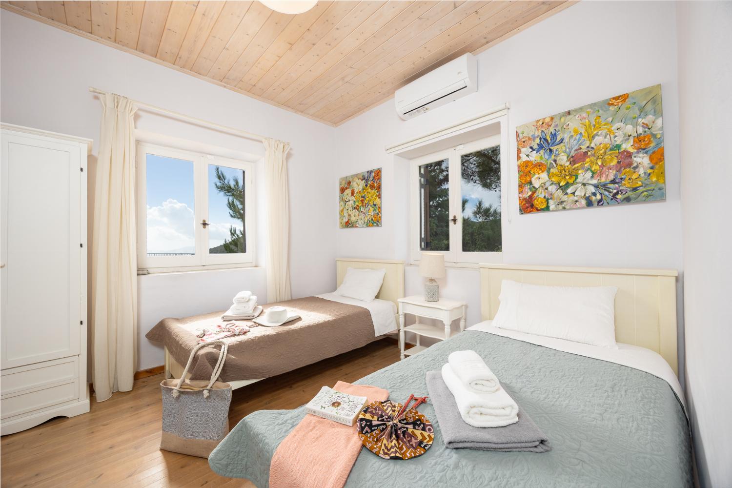 Twin bedroom with A/C