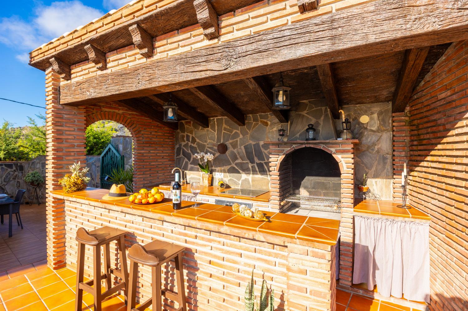 Sheltered terrace area with BBQ