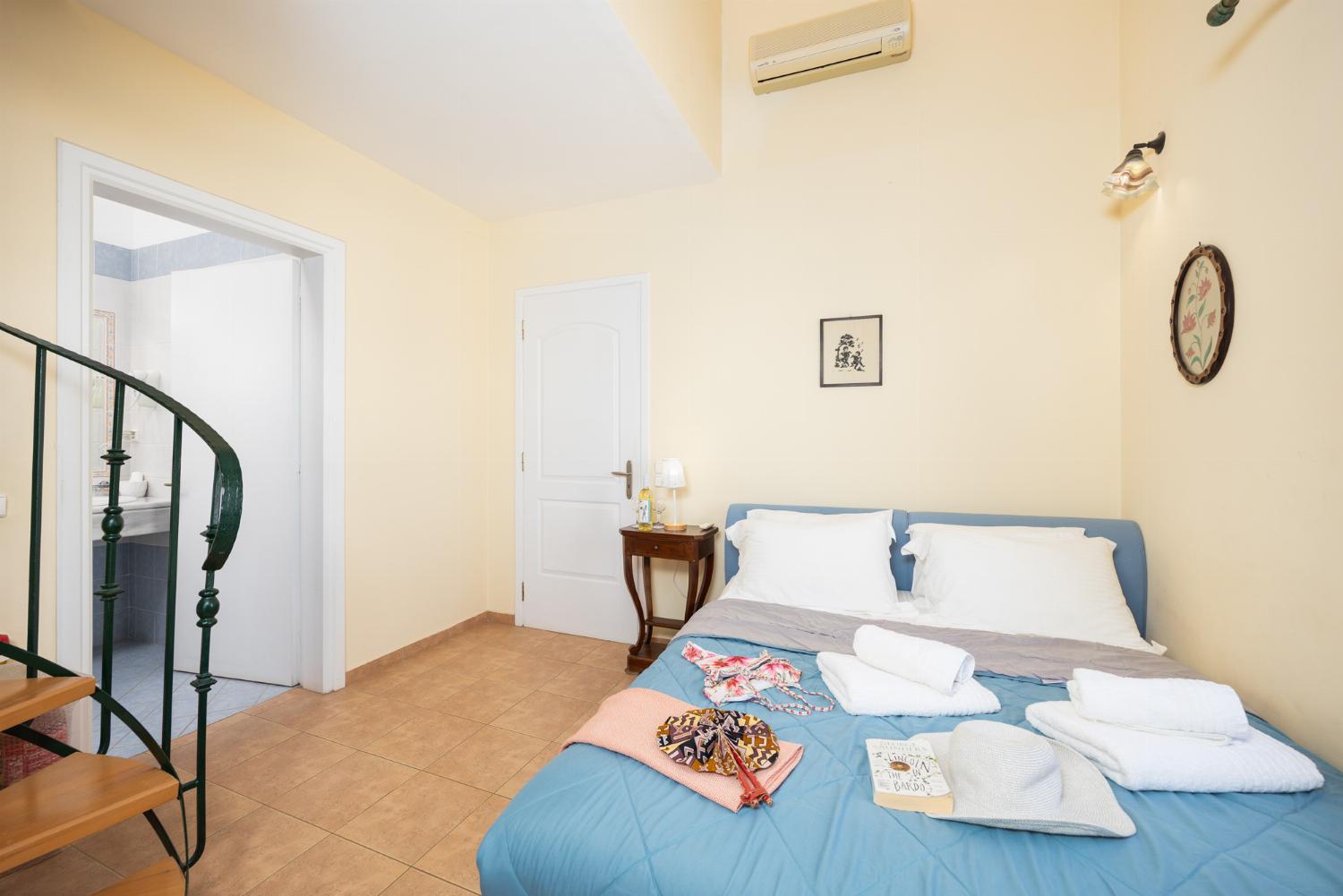 Double bedroom with en suite bathroom and A/C