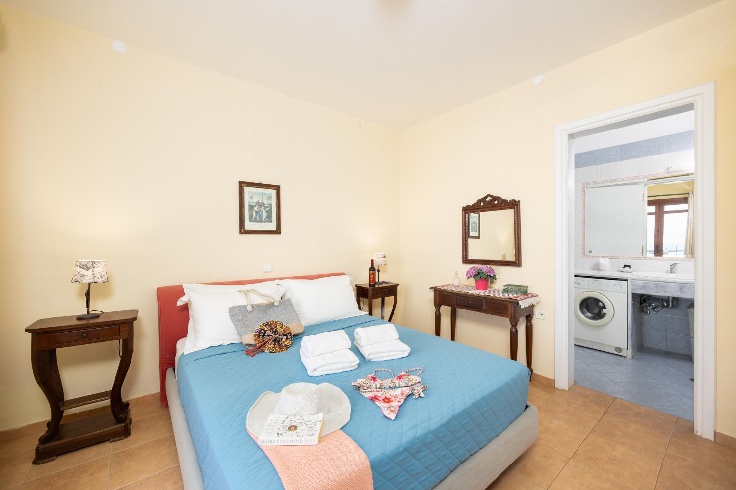 Double bedroom with shared en suite bathroom, and A/C