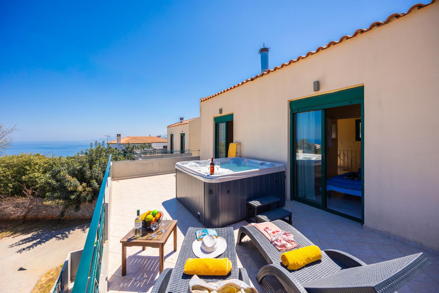 jacuzzi on terrace with sea view