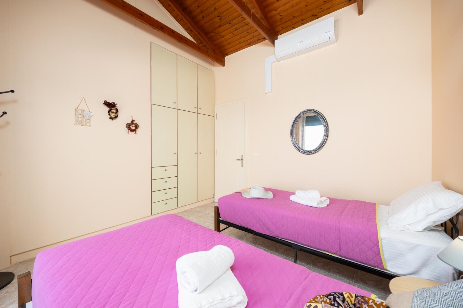 Twin bedroom with A/C