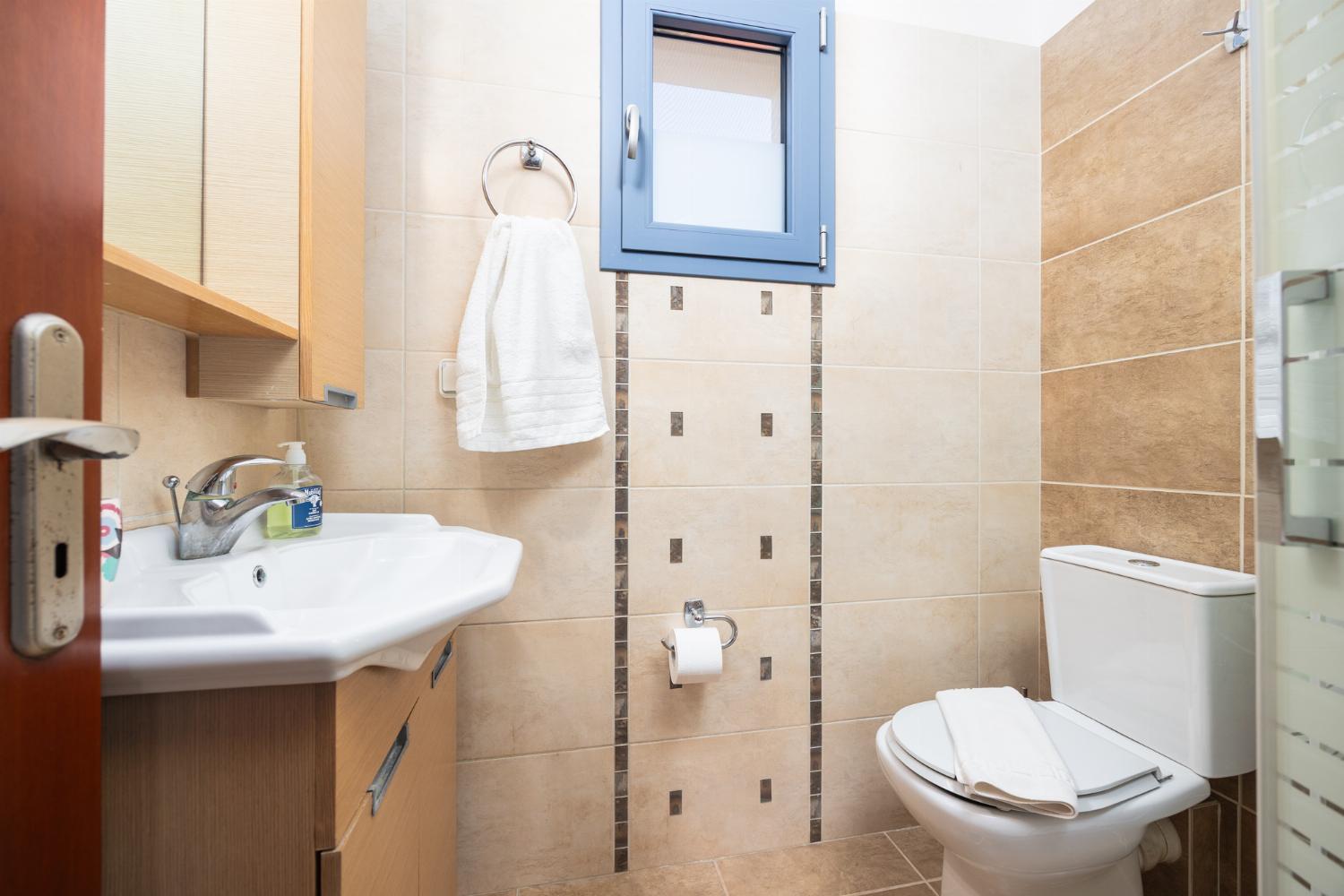 Family bathroom with bath and shower