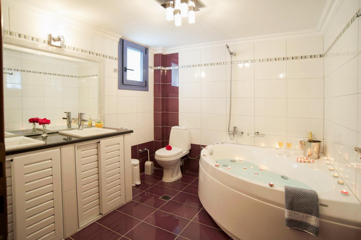 Family bathroom with bath and shower