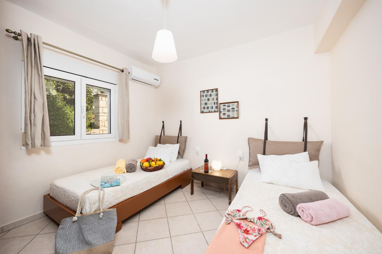 Twin bedroom with A/C