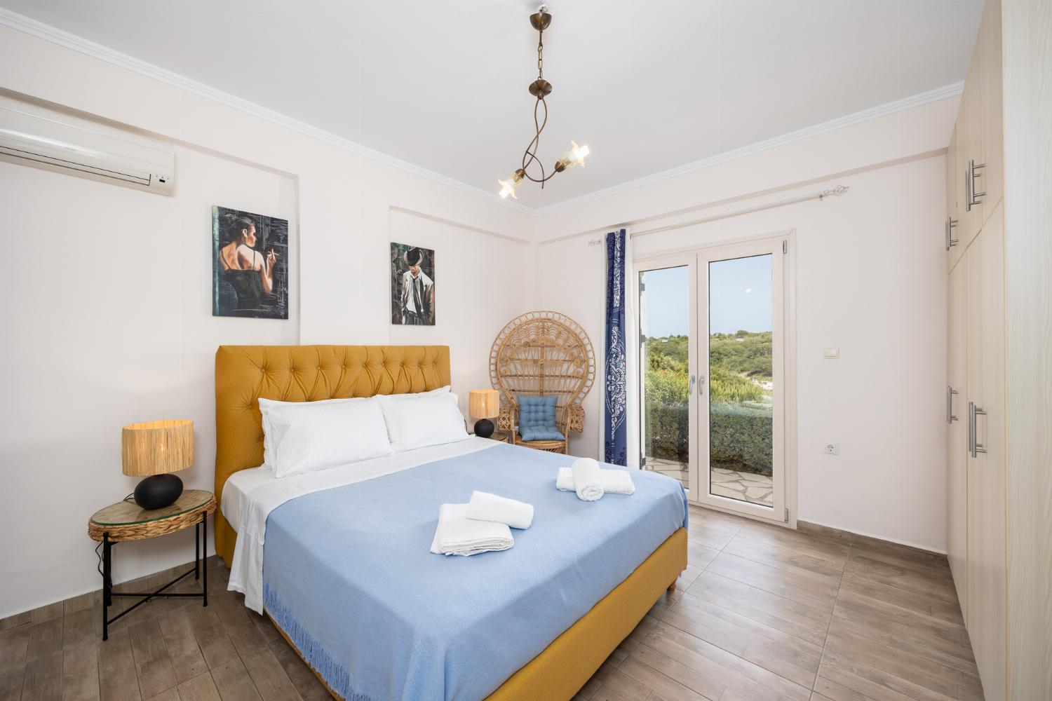 Ground floor: double bedroom with en suite bathroom and A/C