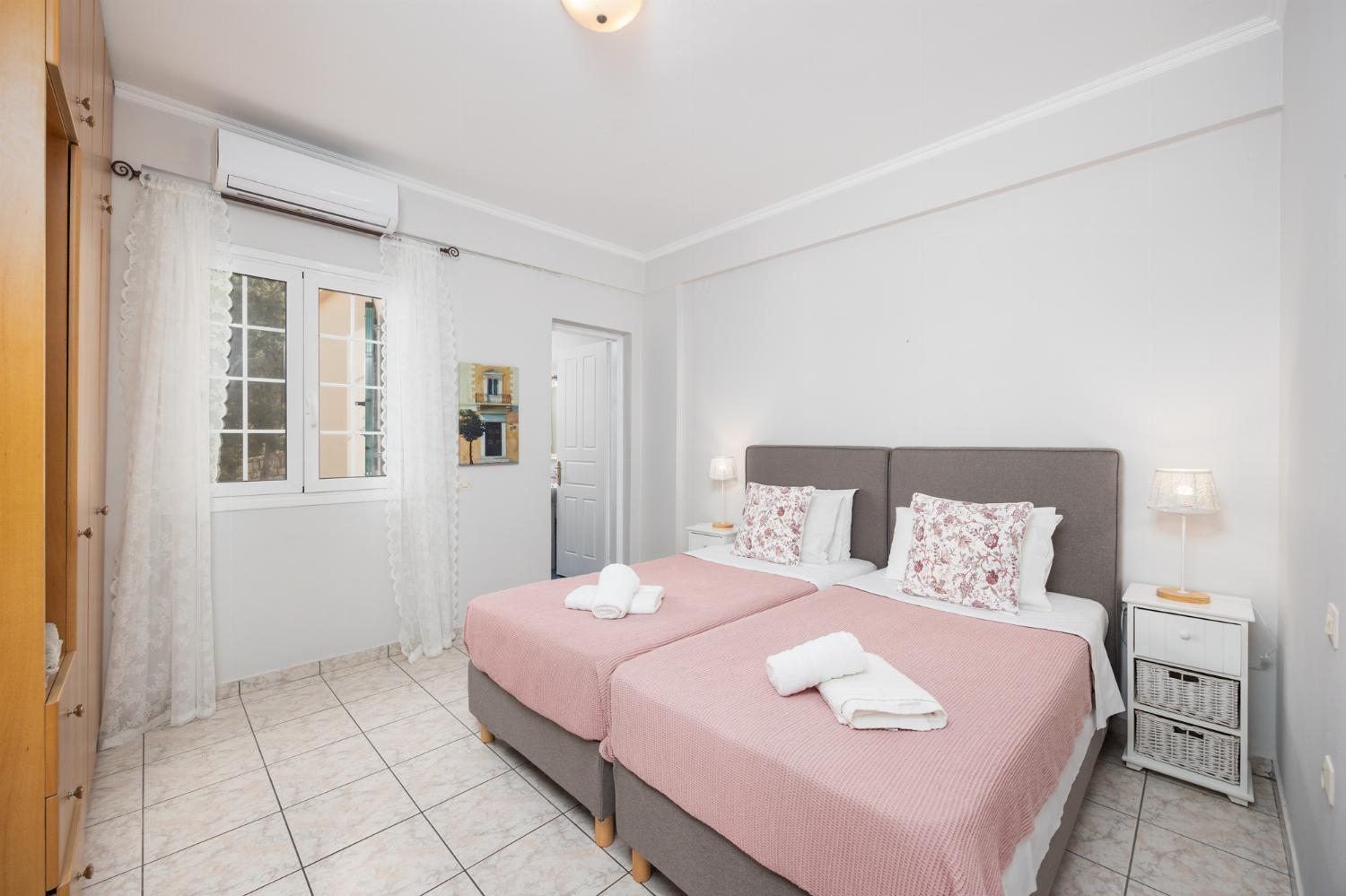 First floor: twin bedroom with en suite bathroom and A/C