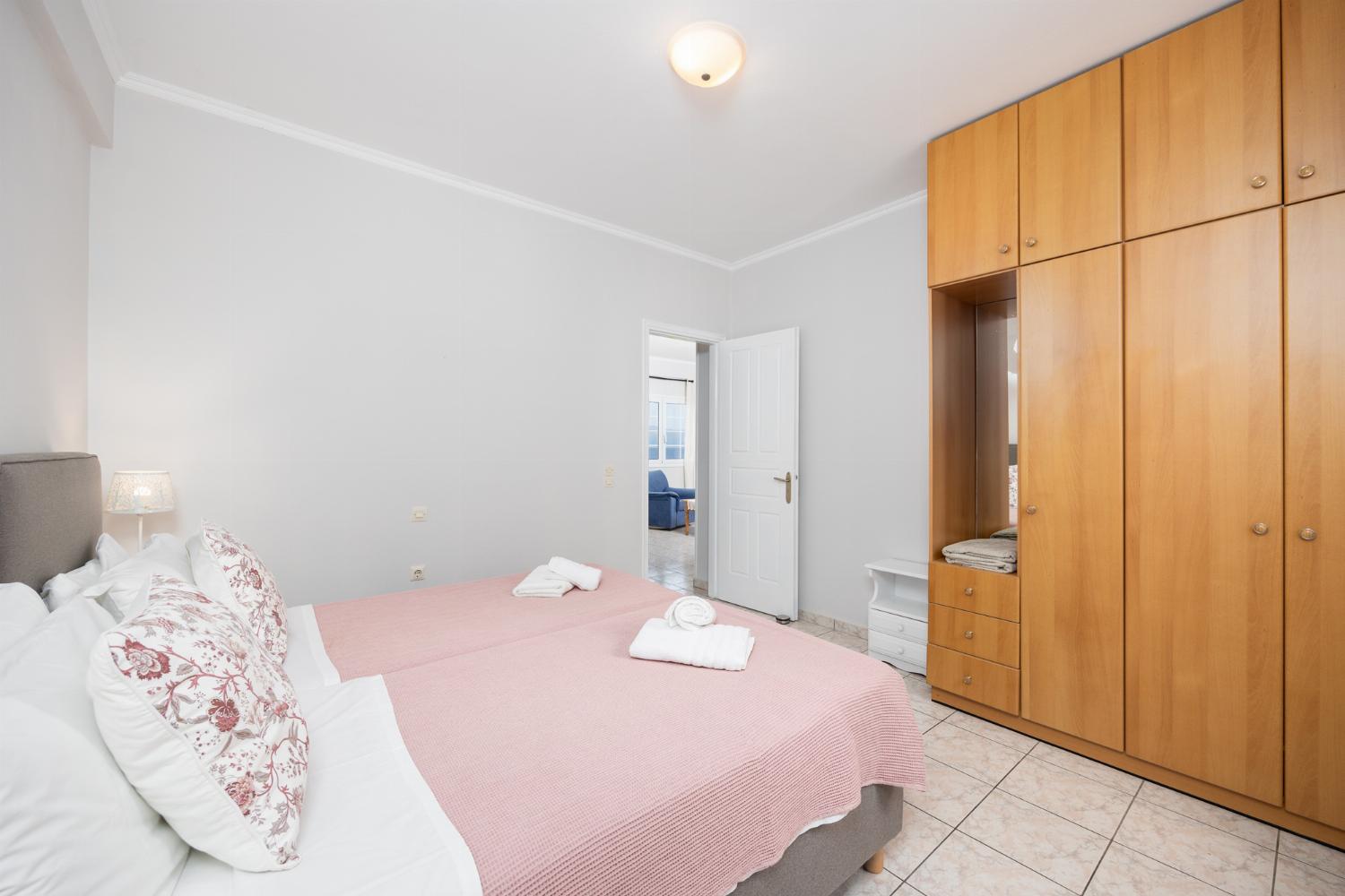 First floor: twin bedroom with en suite bathroom and A/C