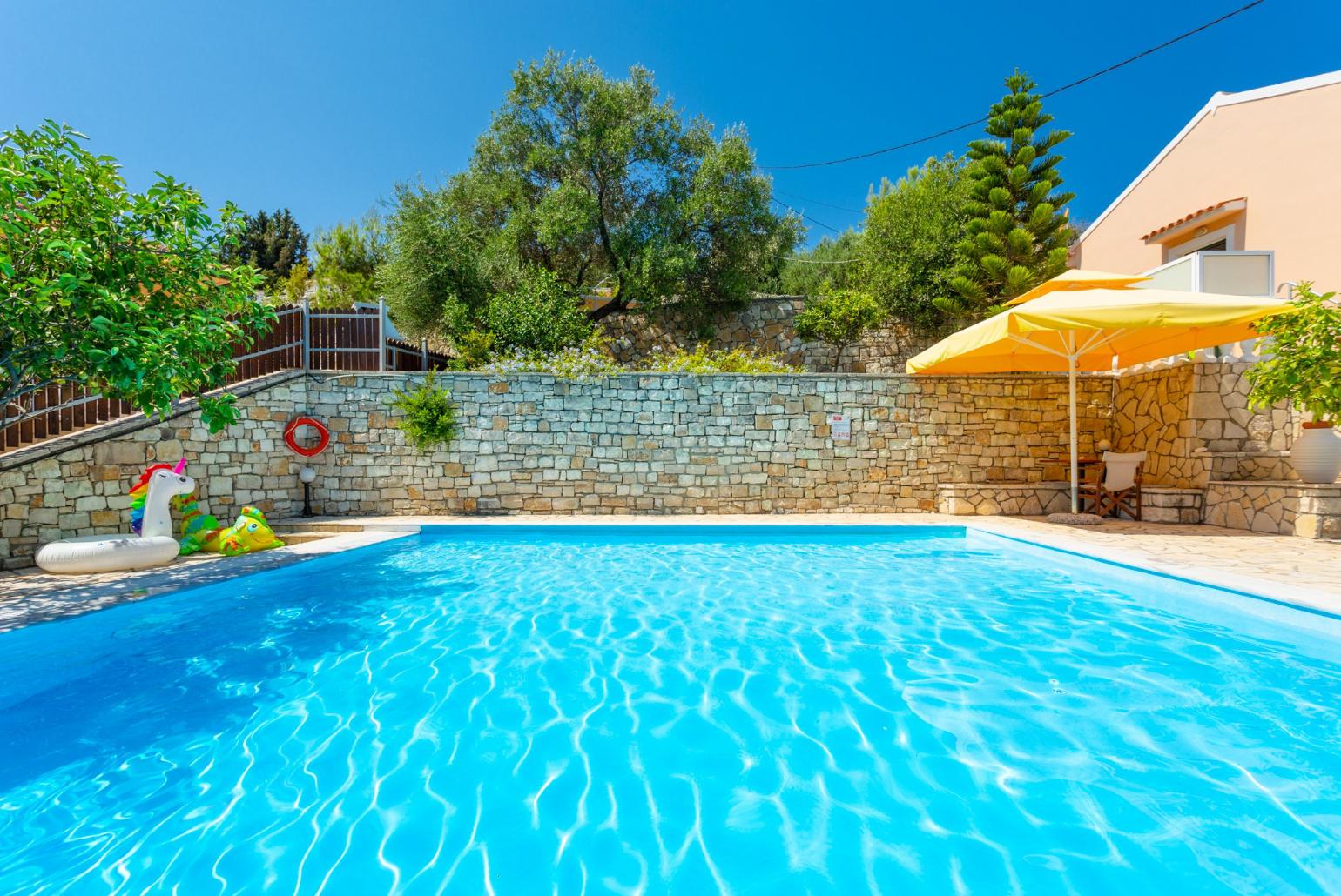 Shared pool and terrace with panoramic sea views