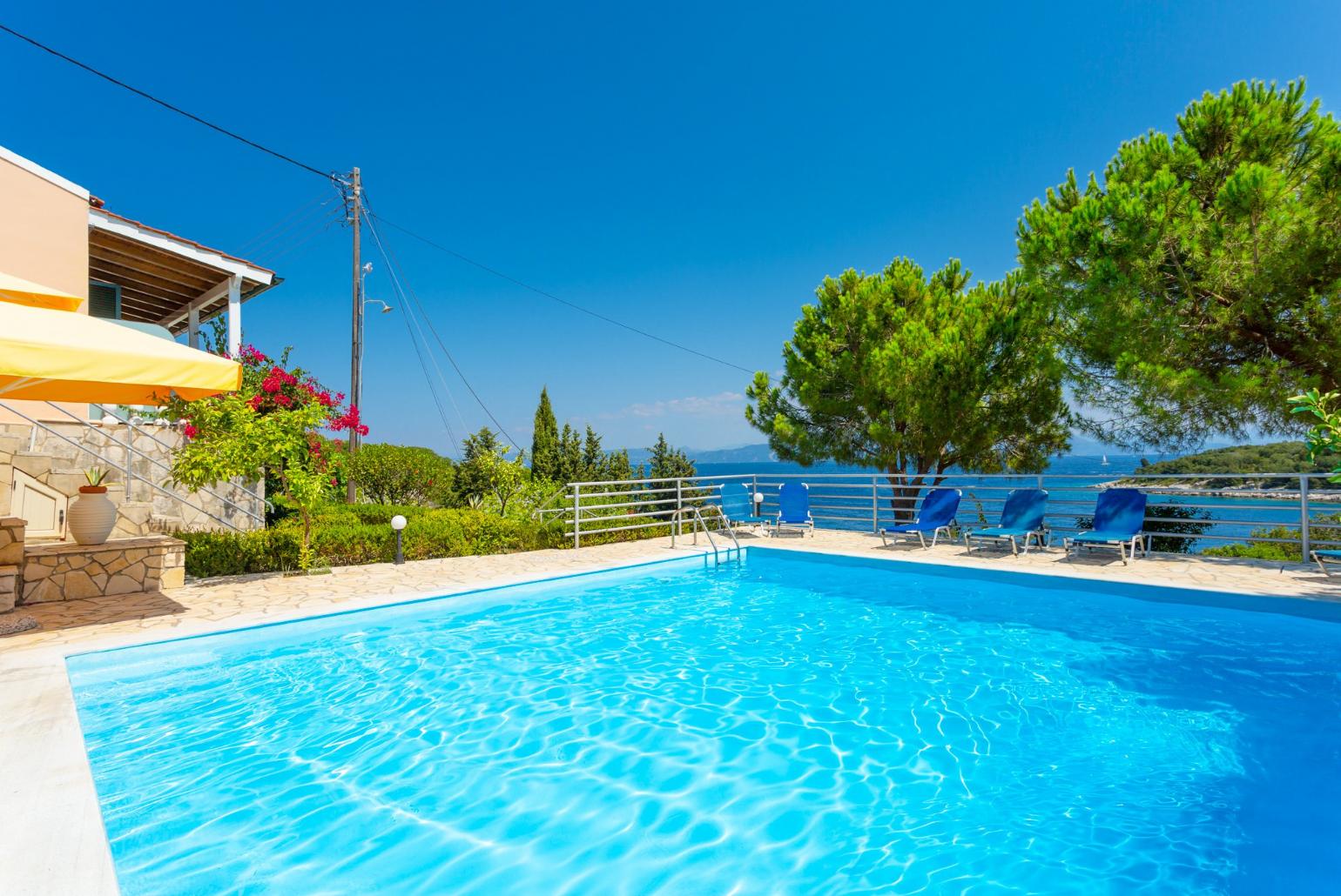 Shared pool and terrace with panoramic sea views