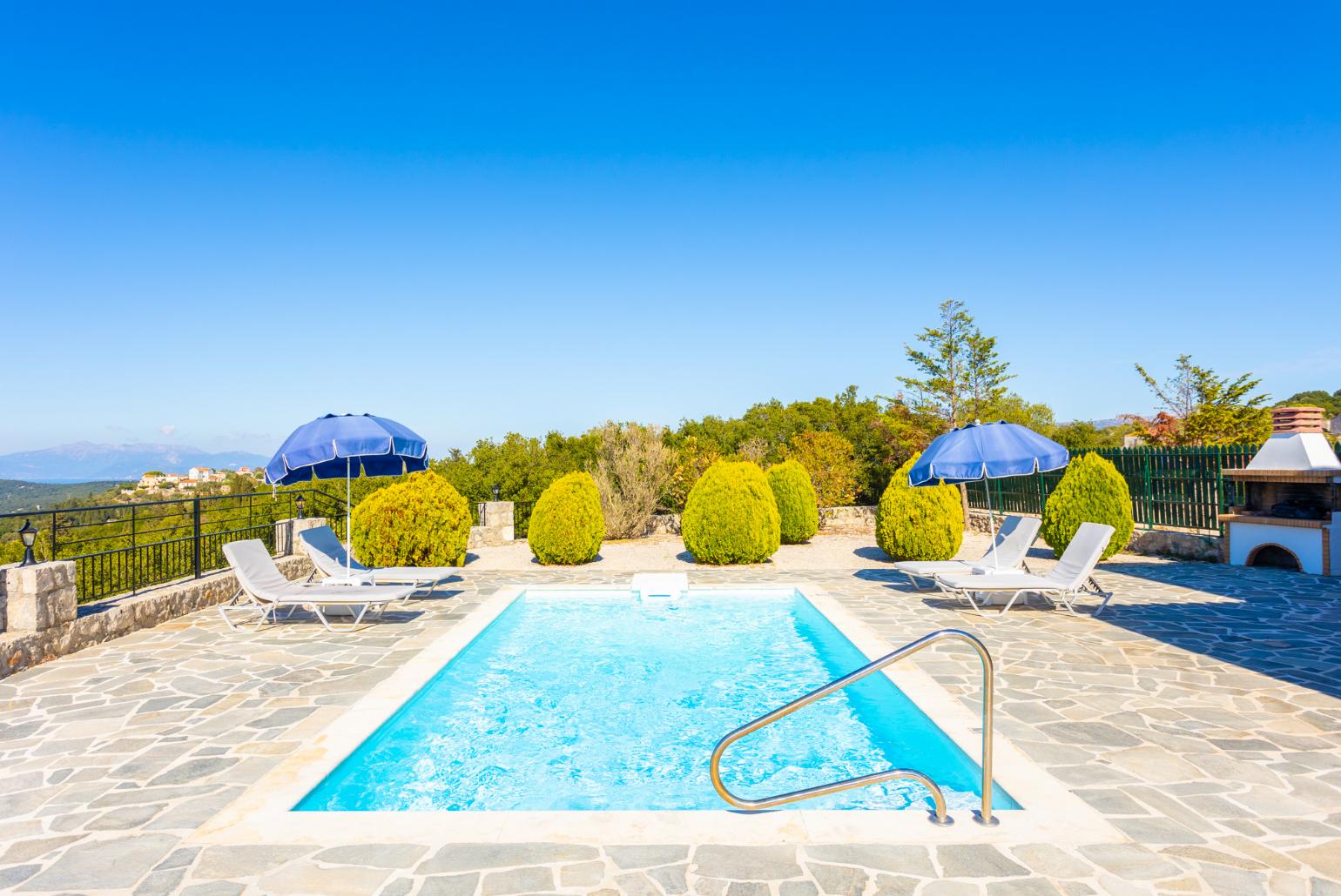 Private pool, terrace, and garden with panoramic sea views