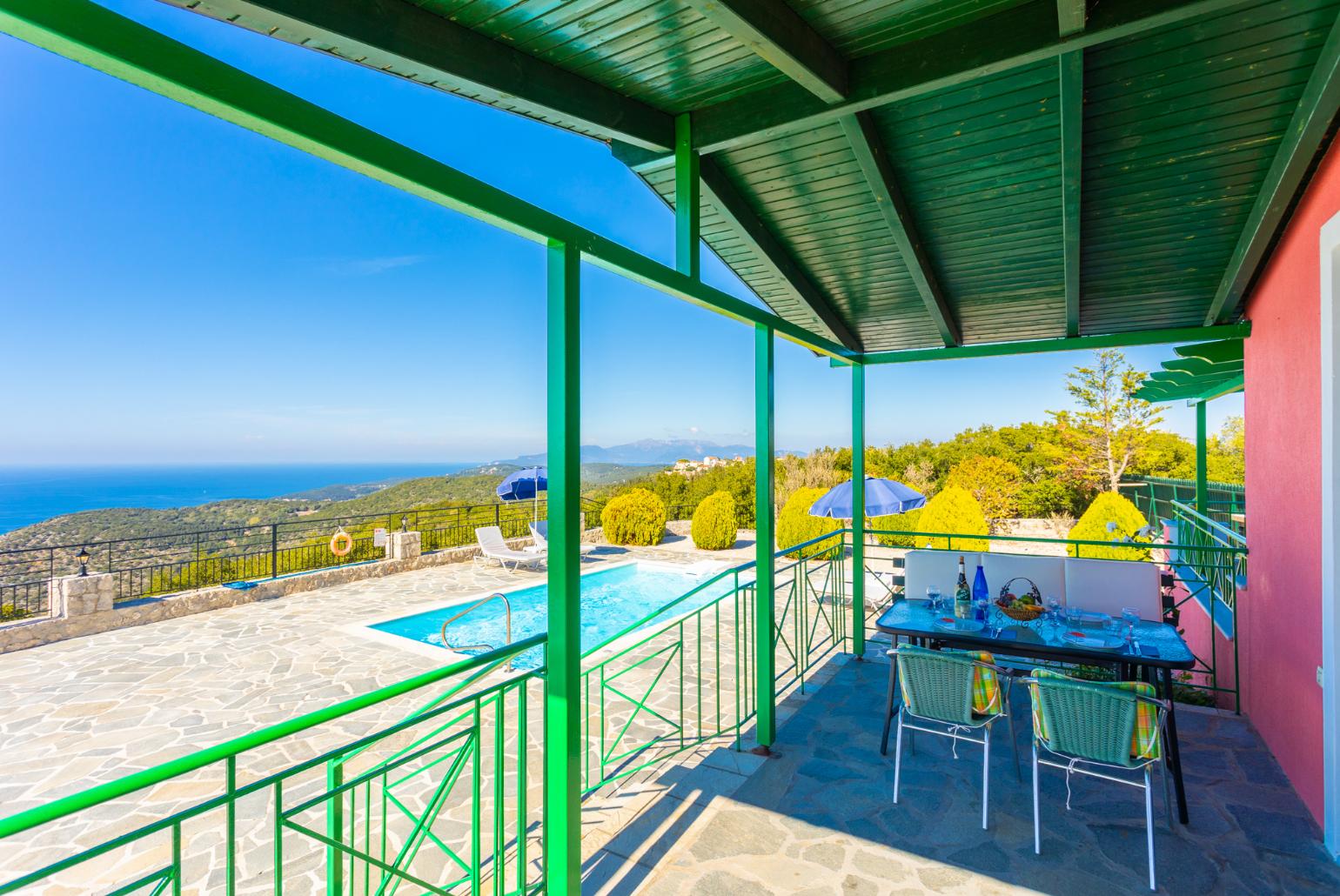 Sheltered terrace area with panoramic sea views