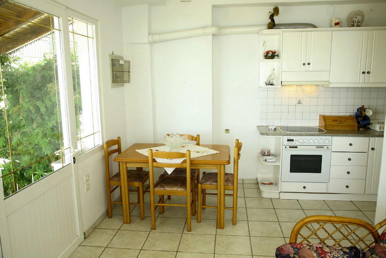 Equipped open plan kitchen and dining area