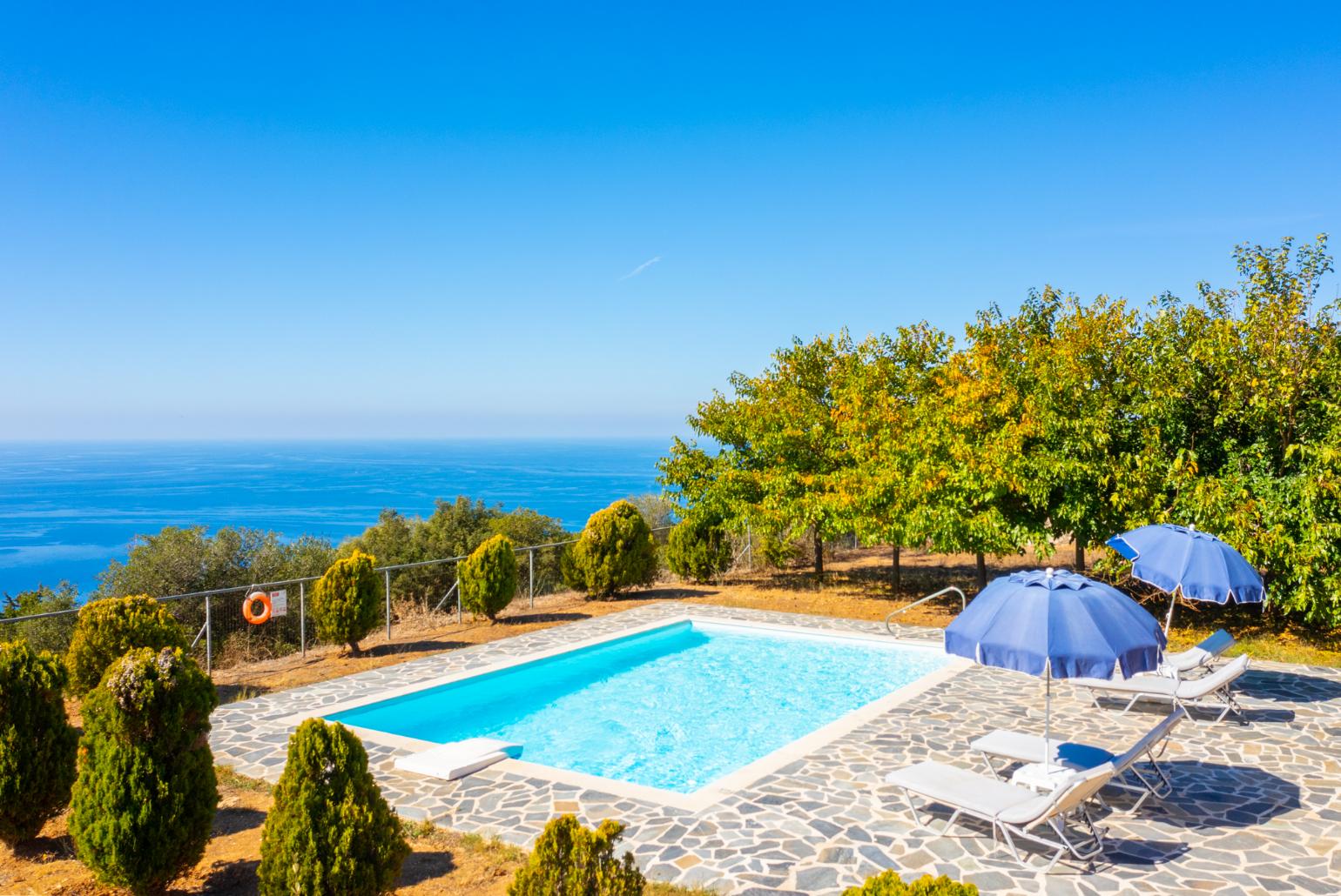 Private pool, terrace, and garden with panoramic sea views