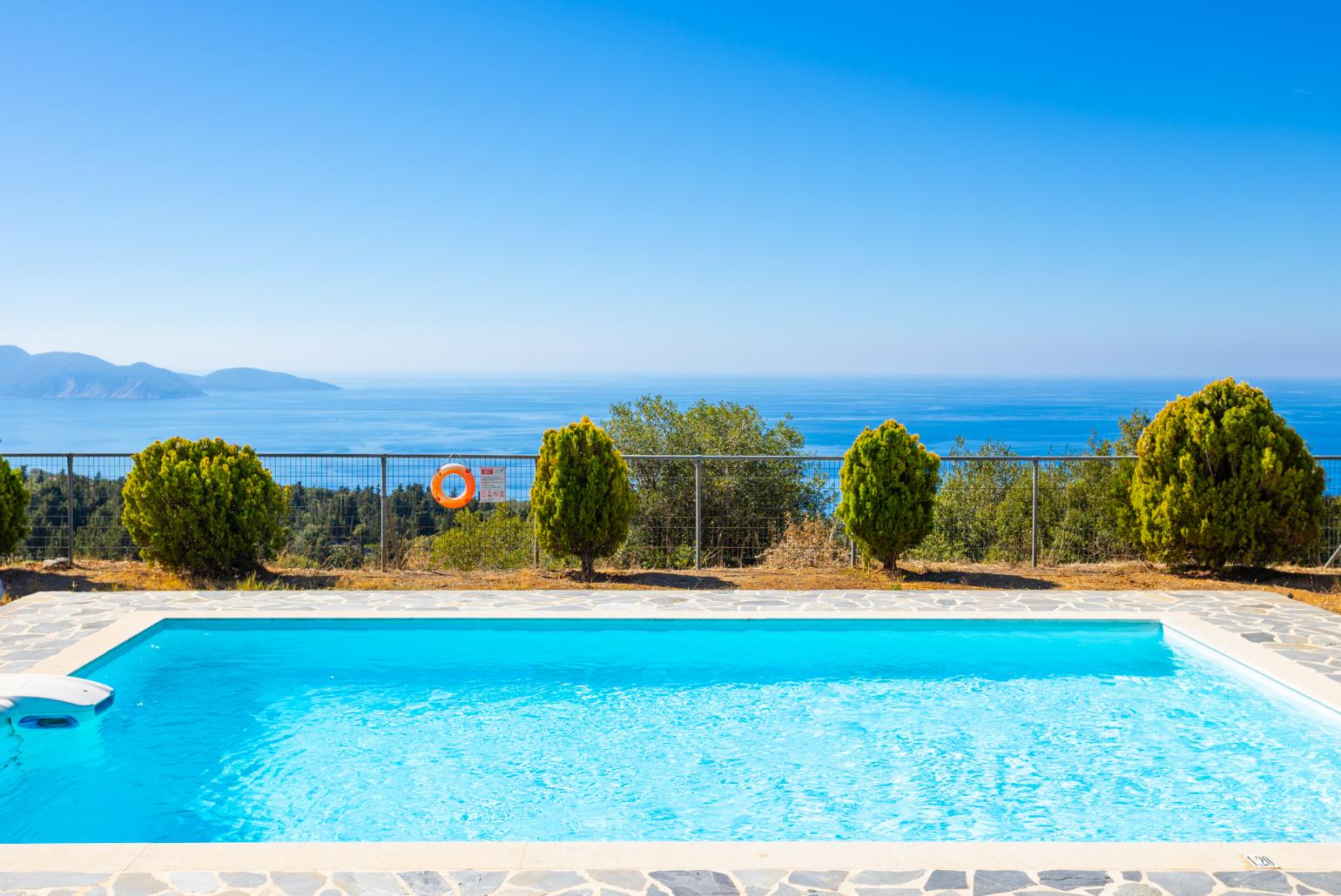 Private pool, terrace, and garden with panoramic sea views