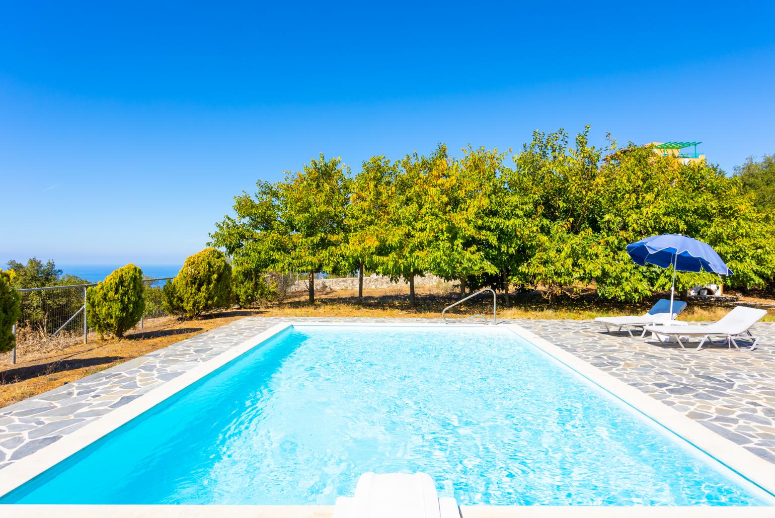 Private pool, terrace, and garden with panoramic sea views