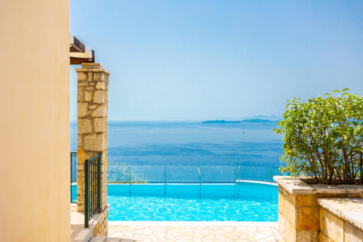 Private infinity pool and terrace with panoramic sea views