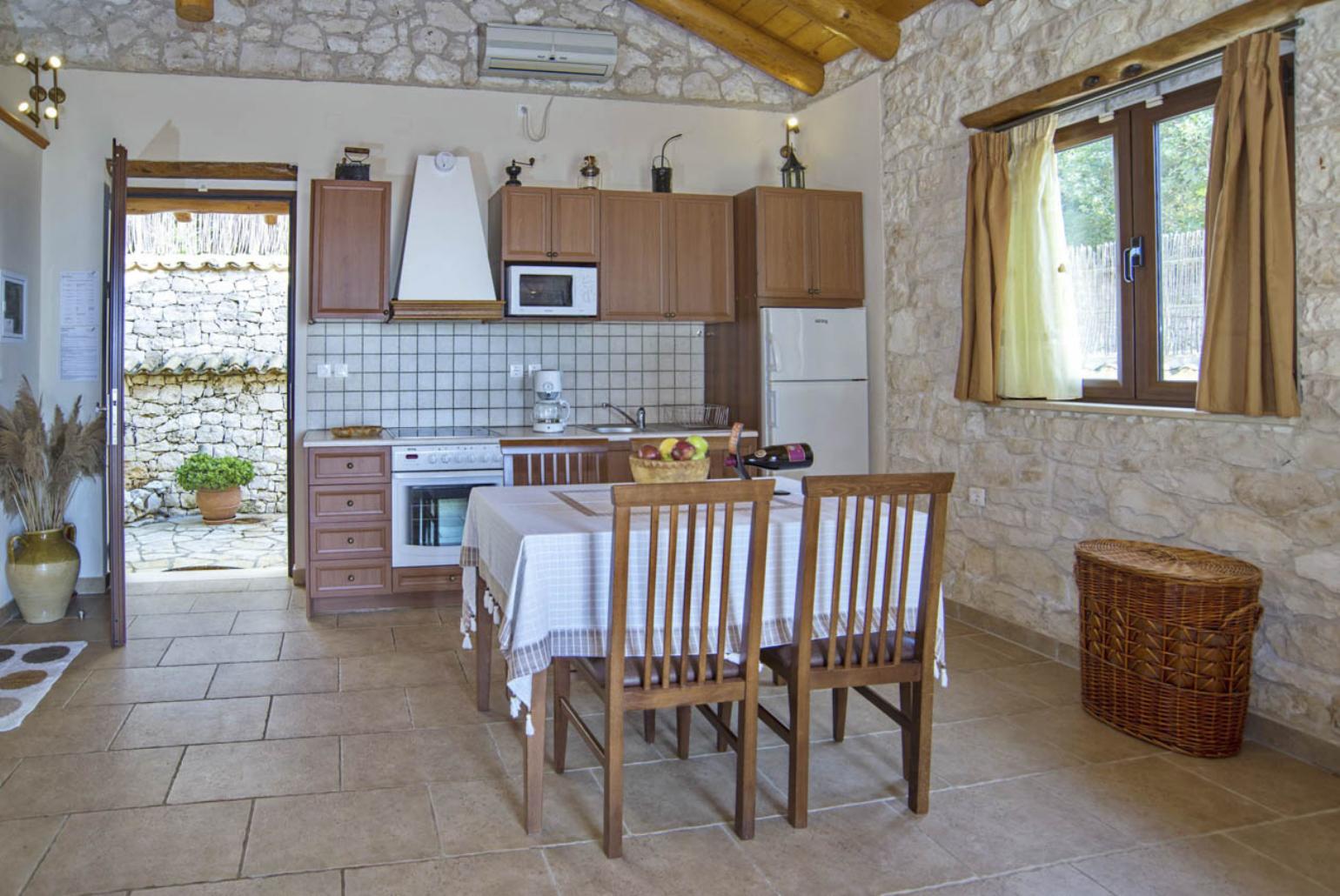 Equipped kitchen and dining area