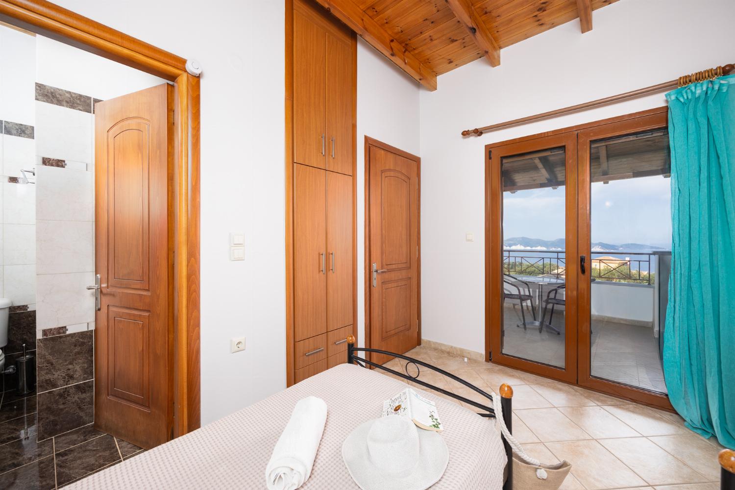 Twin bedroom with en suite bathroom and A/C